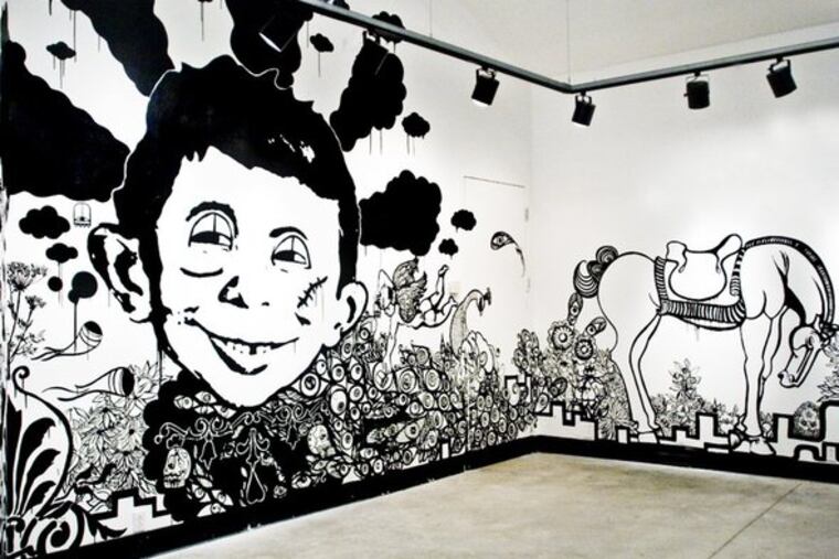 a black-and-white mural by Thomas Buildmore and Morgan Thomas, at Drexel's Leonard Pearlstein Gallery. The title combines "semiotics," the study of signification, and the "Panopticon," a type of prison design.