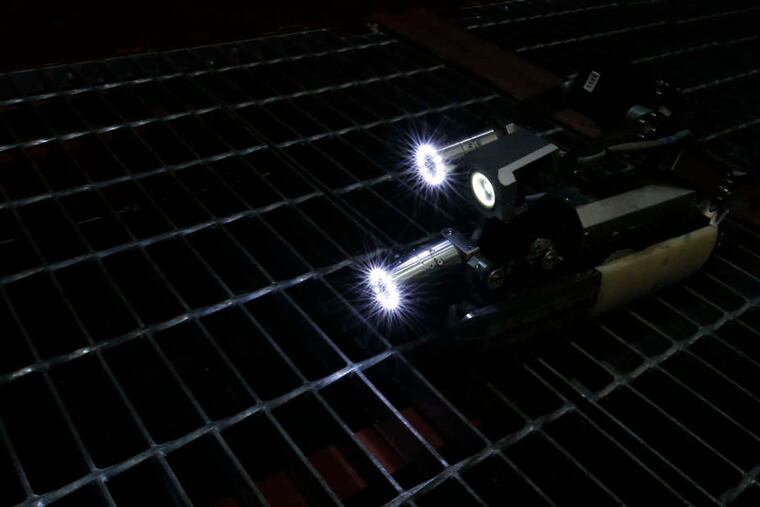 Toshiba Corp.'s small robot, developed with the International Research Institute for Nuclear Decommissioning, operates during a demonstration at a Toshiba plant in Yokohama, Japan. Toshiba unveiled the robot, which was developed to go inside one of the units at Tokyo Electric Power Co.'s Fukushima Dai-ichi nuclear power plant, which was severely damaged in a 2011 earthquake and tsunami.