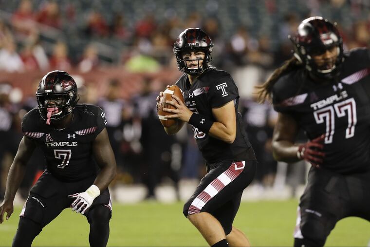 Temple quarterback Anthony Russo looks for a receive with running back Ryquell Armstead against Tulsa on Thursday, September 20, 2018 in Philadelphia. YONG KIM / Staff Photographer