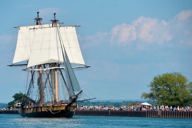 The U.S. Brig Niagara sails through the Presque Isle Channel leading the Parade of Sail opening the 2022 Tall Ships Erie festival on Presque Isle Bay in Erie.
