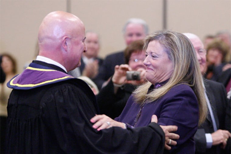 Seamus P. McCaffery and his wife, Lise Rapaport, at his swearing-in for the Pa. Supreme Court. Sources say he is being investigated over fees that his wife received for referring clients. (Elizabeth Robertson / Inquirer Staff)