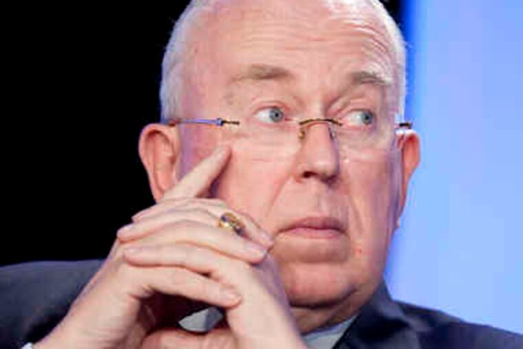 ANDREW HARRER / Bloomberg News