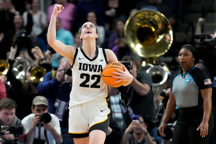 Iowa guard Caitlin Clark celebrates after defeating LSU on Monday to advance to the Final Four.