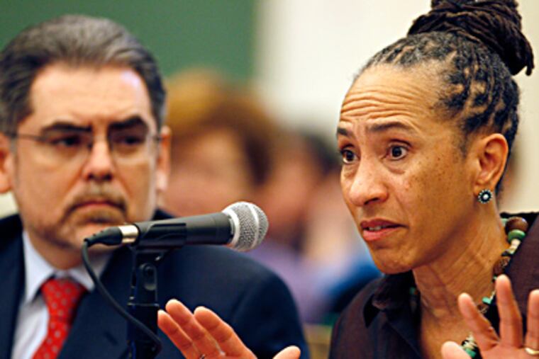 School Reform Commissioner Lorene Cary addresses Council as SRC Chairman Pedro Ramos listens. She is head of the safety committee, and she discussed progress in school security. DAVID MAIALETTI / Staff Photographer