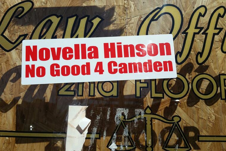 The sticker that was placed on the door of a vacant office on Market Street, across from City Hall.