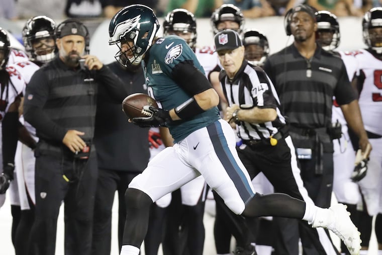 Eagles quarterback Nick Foles catches the football in the new version of the "Philly Special" play that the team ran against the Atlanta Falcons.