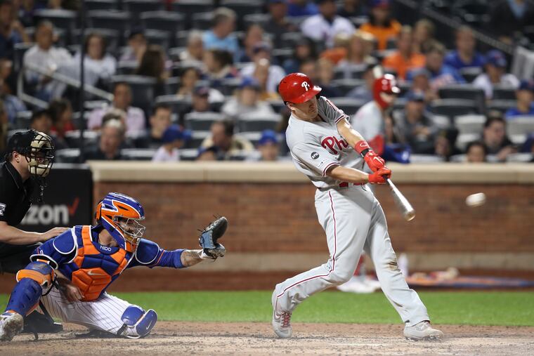 J.T. Realmuto hits an RBI single in the fourth inning.