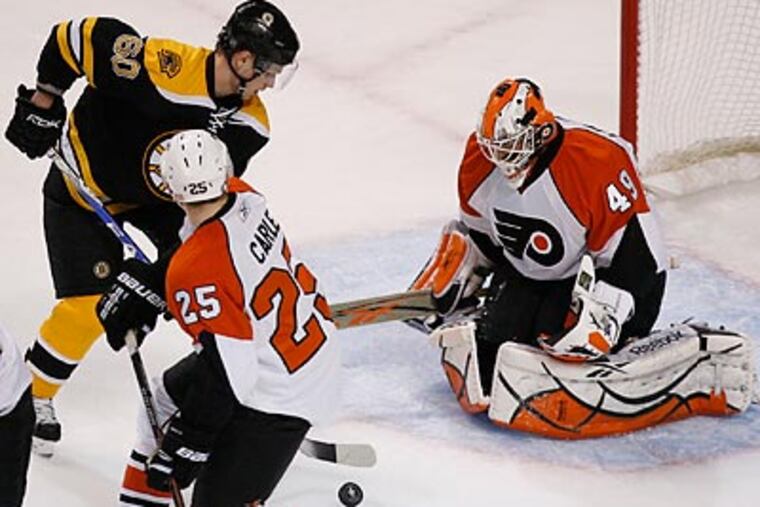 Michael Leighton recovered from a shaky start to backstop the Flyers to their Game 7 victory. (Ed Hille / Staff Photographer)