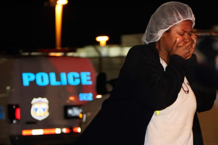 Kraft shooting Byberry and the Blvd., An employee just suspended from her job returned from her car with a 357 handgun and opened fire on 3 co-workers killing 2 of them. A worker shown here leaving the building after the suspect was captured, Thursday, September 9, 2010.