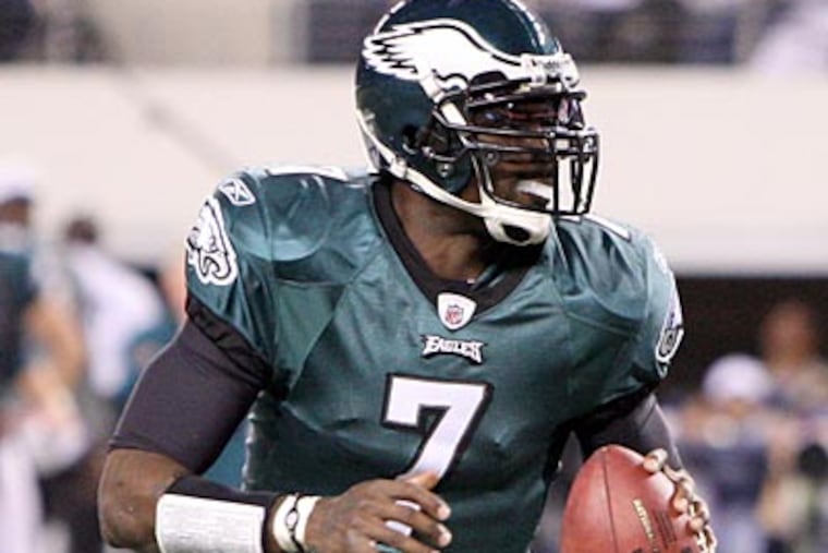 Michael Vick's stellar performance on the field has aided in restoring his image. (Steven M. Falk/Staff file photo)