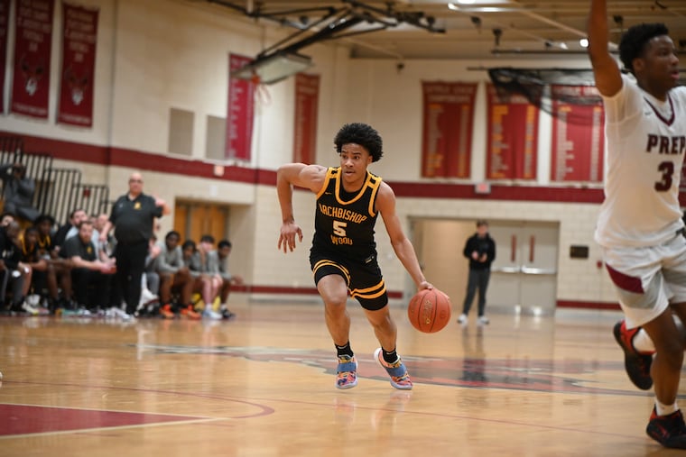 Archbishop Wood's Josh Reed (5) drives to the basket during a game against St. Joseph's Prep on Feb. 6. Wood beat Prep 77-63.