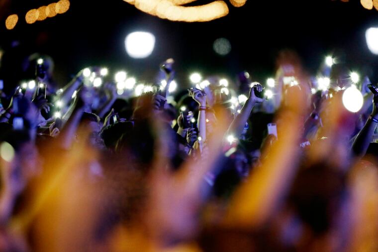 Fans dance to Meek Mill during the Made in America Festival Saturday, September 1, 2018.