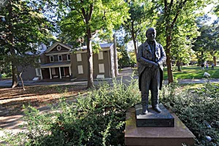 A statue of Stehpen Girard stands in the middle of Girard Park, located between 21st and 22nd Sts. and Shunk and Porter Sts. The mansion in the background is Girard's farmhouse. ( CLEM MURRAY / Staff Photographer )