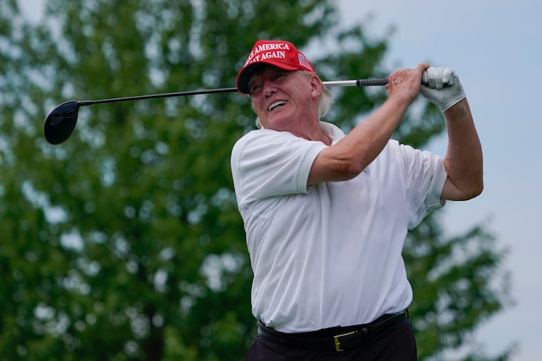 FILE - Former President Donald Trump plays during the pro-am round of the Bedminster Invitational LIV Golf tournament in Bedminster, NJ., on July 28, 2022. (AP Photo/Seth Wenig, File)
