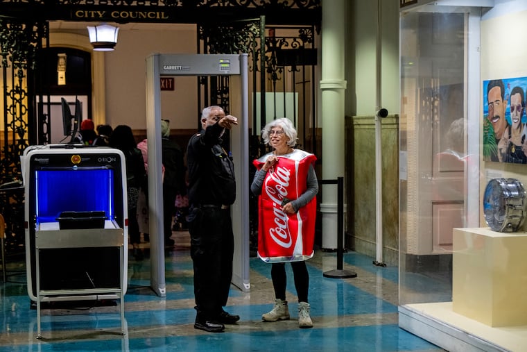 Marcy Boroff with the advocacy group Children First dresses as a soda can to show her support for the tax on sweetened beverages at an October City Council hearing.