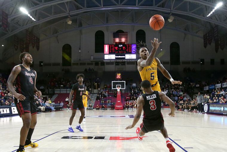 La Salle and Temple faced off at the Palestra but didn't draw much of a crowd to the first game of the Nov. 30 doubleheader.