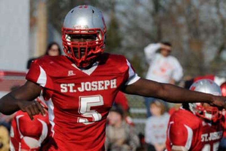 Max Valles of St. Joe's was voted The Inquirer's Defensive Player of the Year. (Ron Tarver/ Staff Photographer)