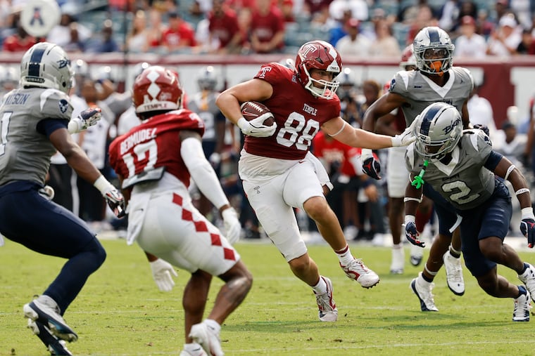 Temple tight end Peter Clarke shoves away Howard cornerback Joseph Tabe after a reception on Sept. 6. He has 23 catches for 378 yards and four touchdowns this season.