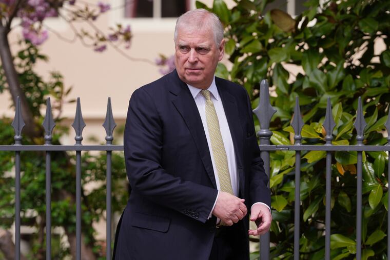 Prince Andrew looks round as he leaves after attending the Easter Matins Service at St. George's Chapel, Windsor Castle, England, in April.