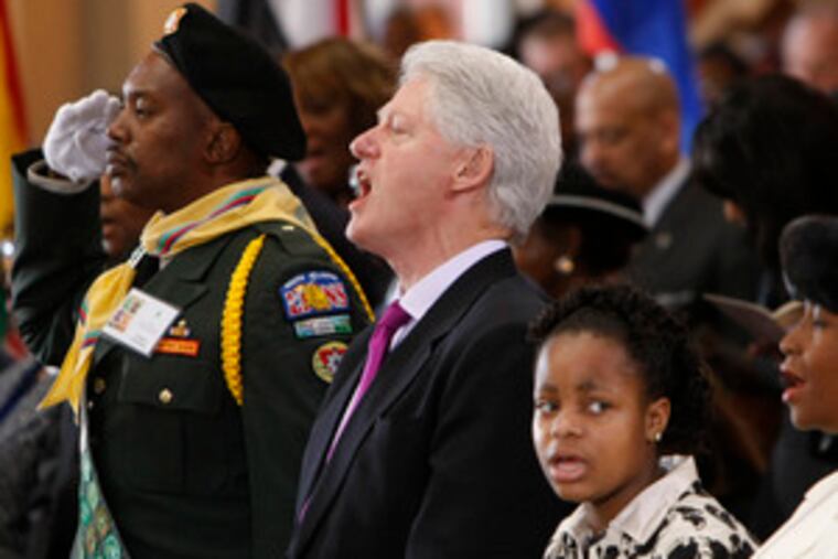 Former President Bill Clinton at Ebenezer Baptist Churchin Atlanta. GOP candidate Mike Huckabee also attended.