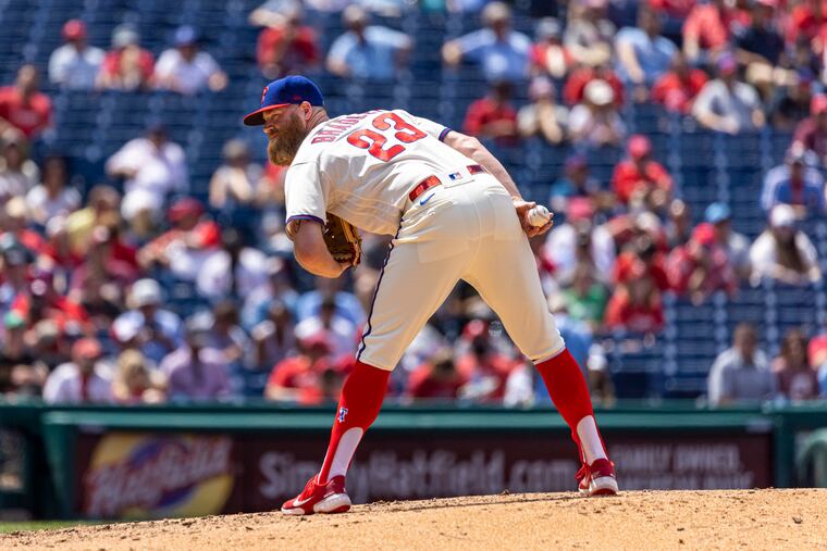 Phillies reliever Archie Bradley keeps an eye on a runner on first base during the fifth inning against the Washington Nationals. Bradley gave up a home run to Kyle Schwarber that tied the score at 5.