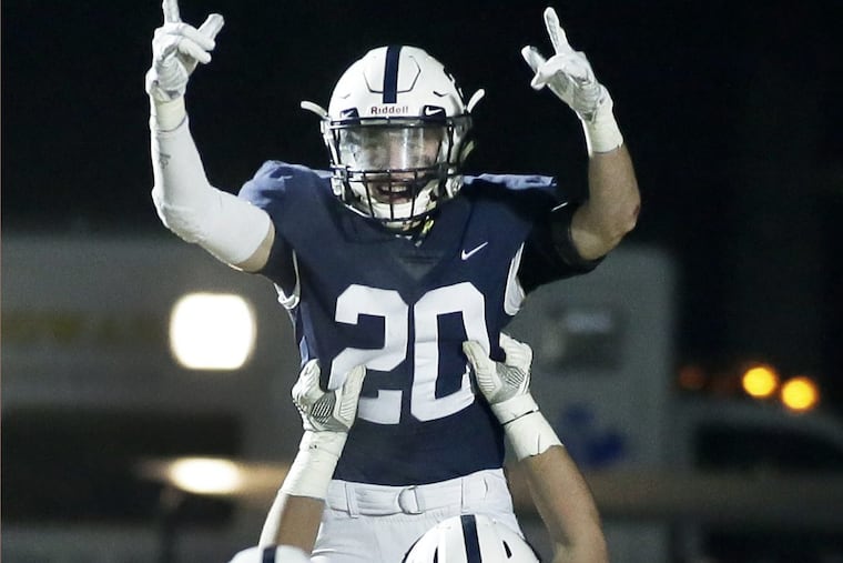 Shawnee’s Jeremy Fisher celebrates after scoring a touchdown against Hammonton in the Group 4 championship game.
