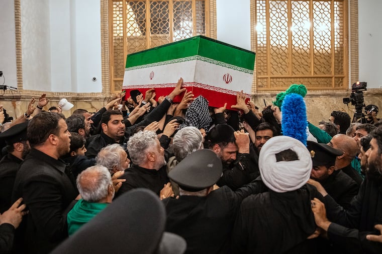 In this photo released by Iran's Supreme Leader's office, mourners carry the coffin of the late Iranian Supreme Leader Ayatollah Ali Khamenei above the crowd for the final prayer before his burial at the Imam Reza Shrine in Mashhad, northeastern Iran, Thursday, July 9, 2026.