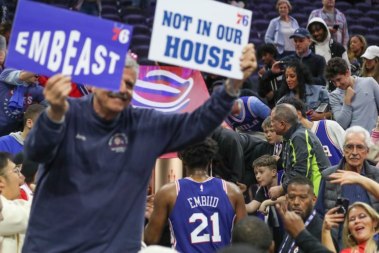 Both Philadelphia 76ers center Joel Embiid exits the floor after a win over the Boston Celtics at the Wells Fargo Center in Philadelphia on Tuesday, April 4, 2023.