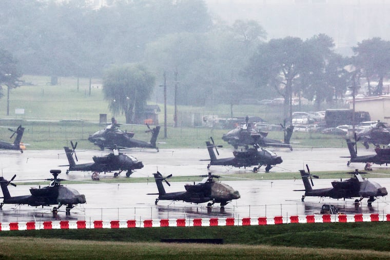 U.S. Apache helicopters are parked at Camp Humphreys in Pyeongtaek, South Korea, Friday, Aug. 21, 2026. A joint drill by U.S. and South Korean Marines scheduled for next month has been cancelled by the U.S.