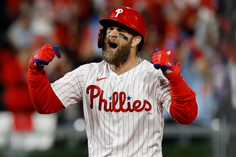 Bryce Harper celebrates his fifth-inning RBI double that gave the Phillies their first lead of Game 4.