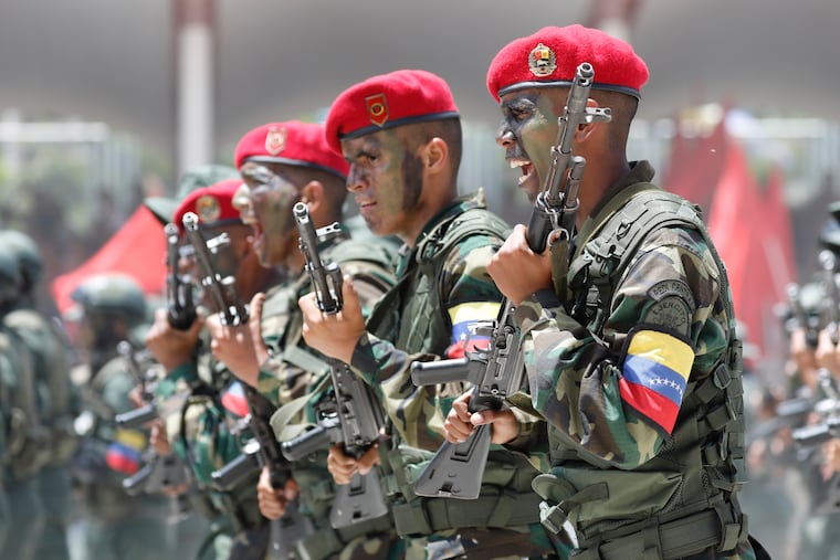 Soldiers march during a military parade marking Independence Day in Caracas, Venezuela, Friday July 5, 2019.