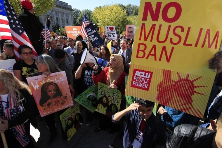 In this Oct. 18, 2017, file photo, protesters gather at a rally in Washington.