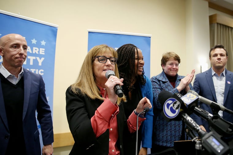 (From left) Delaware County Councilman Brian Zidek; newly elected Councilwomen Elaine Schaefer, Monica Taylor, and Christine Reuther; and current Councilman Kevin Madden celebrate during the Delaware County Democratic Committee's election watch party Tuesday.