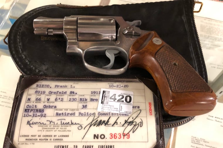 The .38-caliber, five-shot Smith & Wesson pistol once owned by Frank Rizzo, along with the carry permit, was auctioned off Tuesday night at Uniques and Antiques in Delaware County.