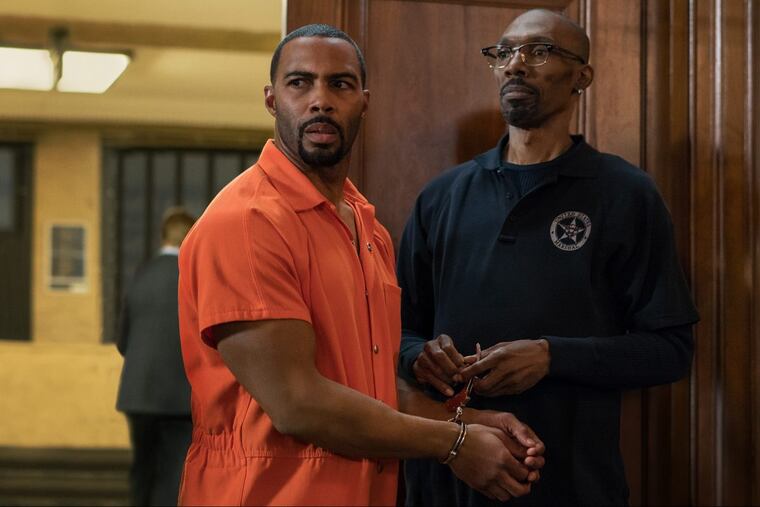 "Power" star Omari Hardwick (left) with Charlie Murphy. Murphy, who plays a prison guard in the upcoming season, died in April of leukemia