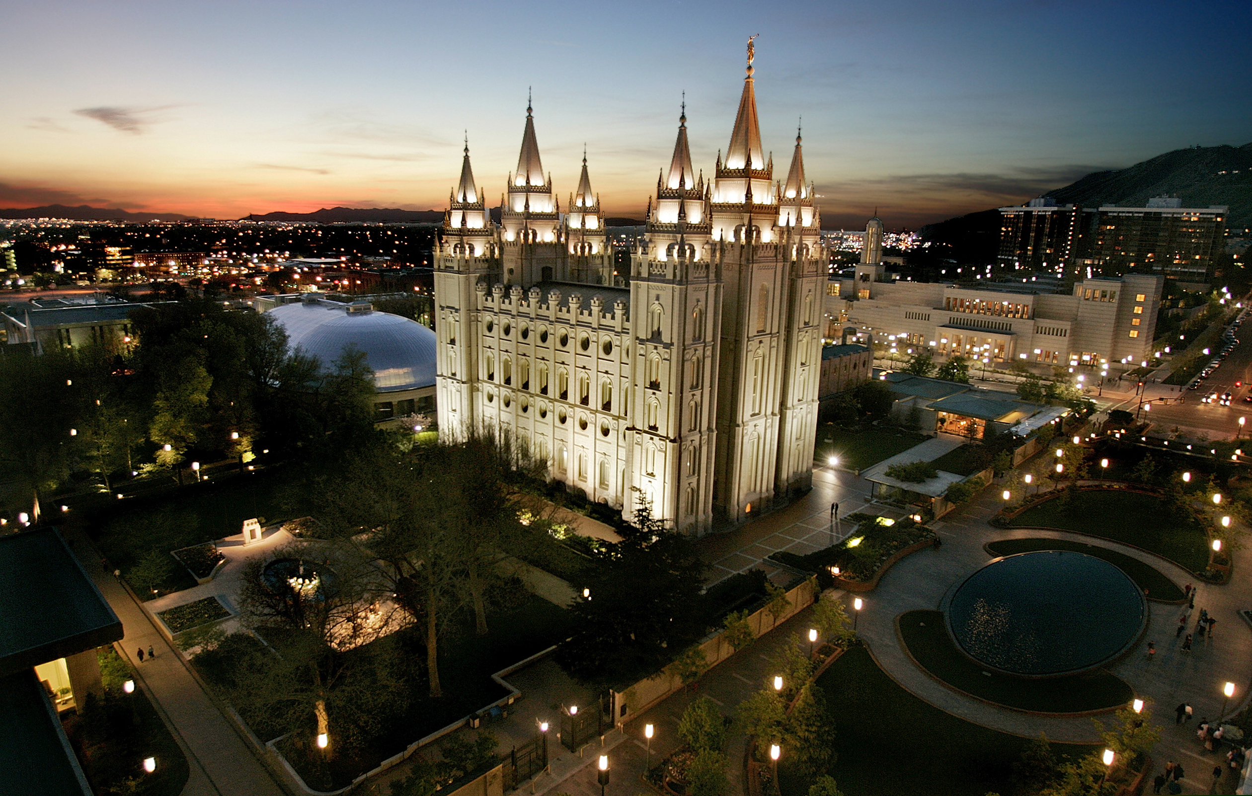 In this April 27, 2006, file photo, the sun sets behind the Mormon Temple, the centerpiece of Temple Square, in Salt Lake City.
