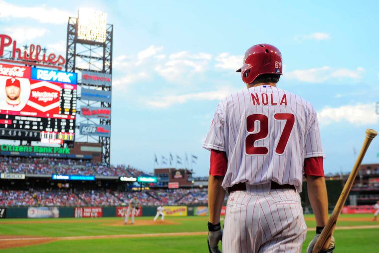 Aaron Nola taking an at-bat at Citizens Bank Park.