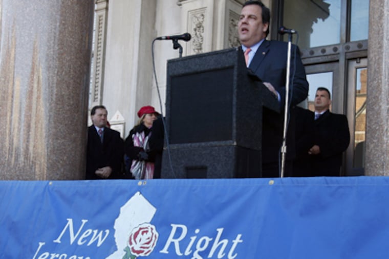 New Jersey Gov. Chris Christie stands on the Statehouse steps Monday, in Trenton, N.J., as he addresses an antiabortion rally. (Mel Evans / AP Photo)