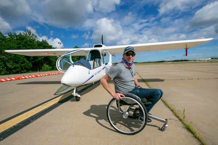 Pilot Sean O'Donnell preparing at Northeast Airport in Philadelphia for his flyover of MossRehab on Wednesday. He was honoring health care workers at the Elkins Park campus.