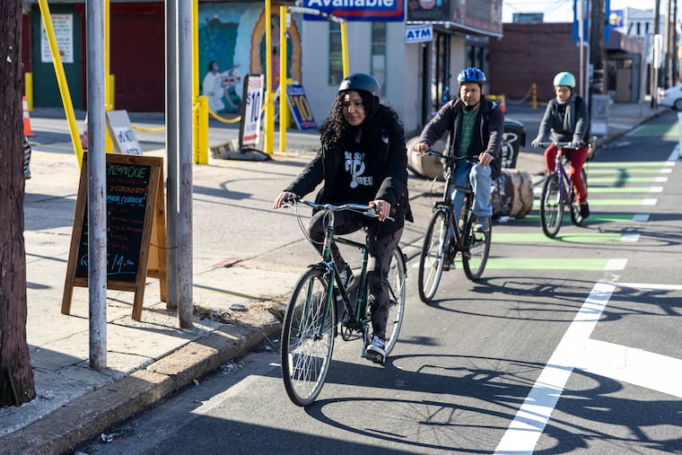 Sarahi Franco-Morales, 17, of South Philadelphia, Pa., leads her parents, Martin Franco and Dora Morales, on a bicycle ride along Washington Avenue. The three of them commute everywhere by bike.