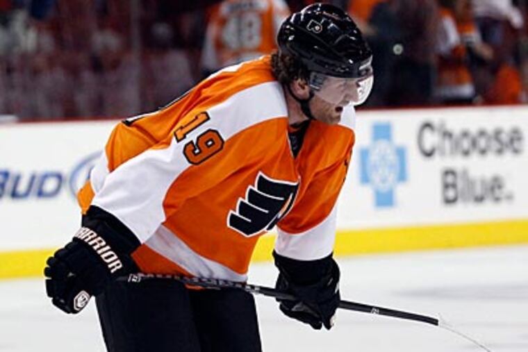 Scott Hartnell skates off the ice after the Flyers fell to the Sabres, 1-0, in Game 1. (Yong Kim/Staff Photographer)