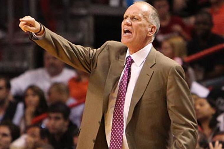 "We know as coaches that when you hit rough waters you become the dart board," Doug Collins said. (David Santiago/AP)