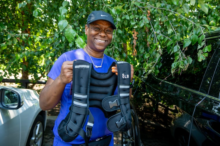 Marquena Carter of North Philadelphia along Waterworks Drive after her workout with an 8-pound weighted vest Sunday, Aug. 3, 2025.