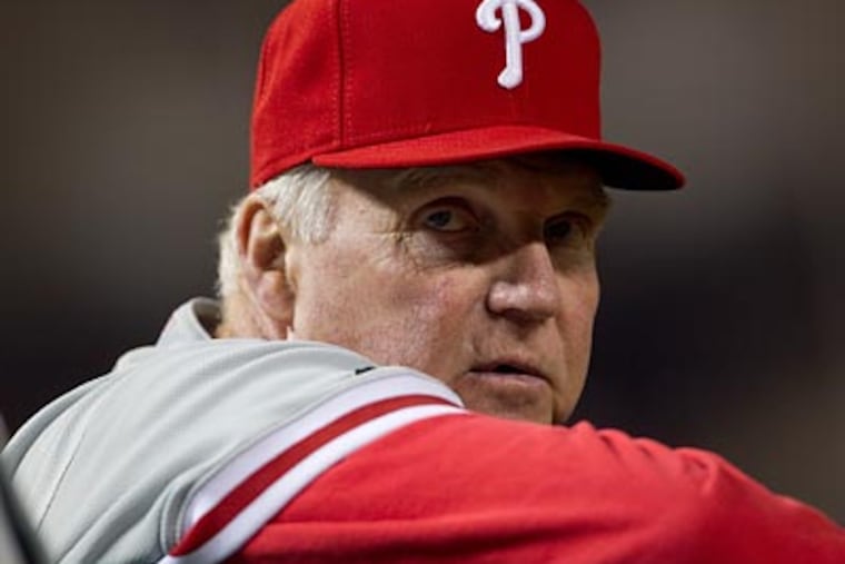 "At any point we can go off and score a bunch of runs," Phillies manager Charlie Manuel said. "I know we can." (Evan Vucci/AP)