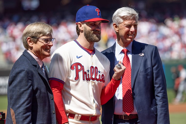 Agent Scott Boras said he believes Phillies owner John Middleton (left) and president Dave Dombrowski (right) want Bryce Harper to finish his career Philadelphia.