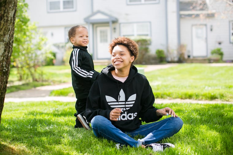 Carmelita Murphy plays with her two-years-old son DJ Bond outside their house in Absecon, NJ on Friday, April 30, 2021. Murphy suffered a rare type of heart failure 12 days after the birth of her baby boy, in 2018.