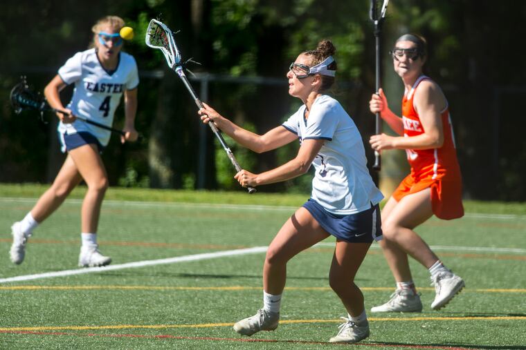 Eastern's Tori Accardo (center), shown here on May 21, scored a goal in the first half to give the Vikings the lead at halftime.