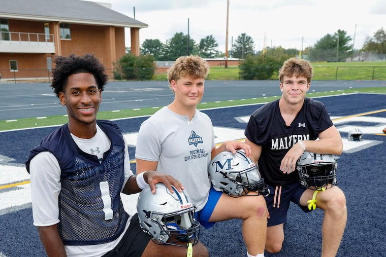 Malvern Prep's Cade Cooper (left), Tyler Graham, and George Parkinson IV are bound to play college football at the Division I level.