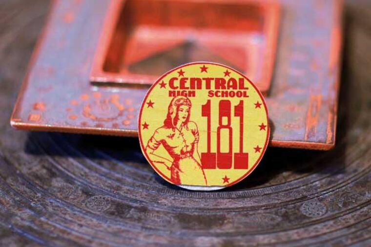 Jules Silk's wooden commemorative coin used in 1944, as metal was saved for the WW II, Thursday, May 1, 2014. ( DAVID SWANSON / Staff Photographer )