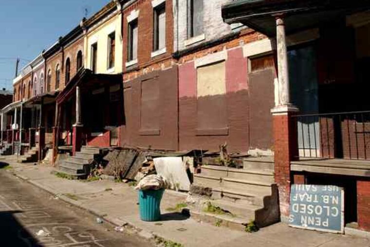 Frances Burns, above, Philadelphia L&I chief, says the average cost of knocking down abandoned houses is now $13,000, down from $24,000 in recent years.